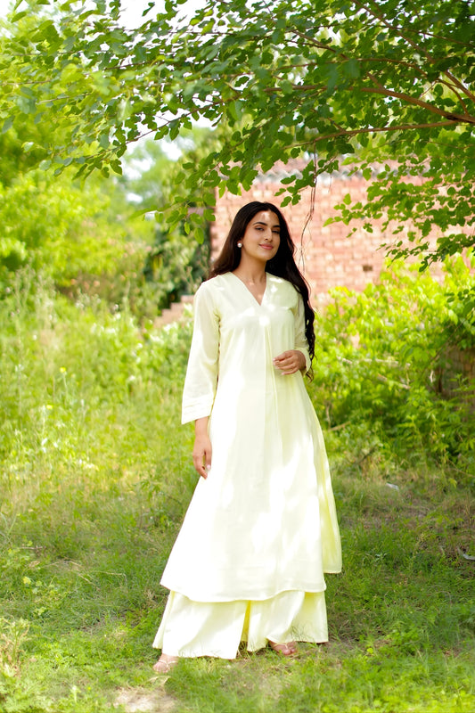 Outstanding Off-White Cotton Co-Ord Set with V-Neck 3/4 Sleeve Kurta and Straight Pants