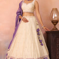 Elegant Cream Jacquard Silk Embroidered Lehenga Choli with Purple Dupatta