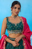 Luxurious Dark Green Cosmos Silk Embroidered Lehenga Choli with Pink Dupatta