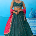  Luxurious Dark Green Cosmos Silk Embroidered Lehenga Choli with Pink Dupatta