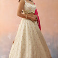 Beautiful Cream Cosmos Silk Embroidered Lehenga Choli with Pink Dupatta