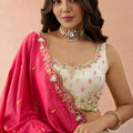 Beautiful Cream Cosmos Silk Embroidered Lehenga Choli with Pink Dupatta