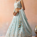 Graceful Sky Blue Tissue Embroidered Wedding Lehenga Choli with Dupatta