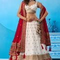 Stylish White Chinon Embroidered Wedding Lehenga Choli with Red Dupatta