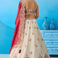 Stunning Off-White Tissue Embroidered Lehenga Choli with Red Dupatta for Women