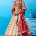 Brilliant Off-White Jacquard Embroidered Lehenga Choli with Red Dupatta for Women