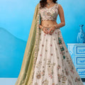 Amazing Off-White Tissue Floral Embroidered Lehenga Choli with Olive Green Dupatta for Women
