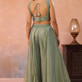 Wonderful Pista Green Tissue Party Wear Crop Top Palazzo Set with Embroidered Jacket