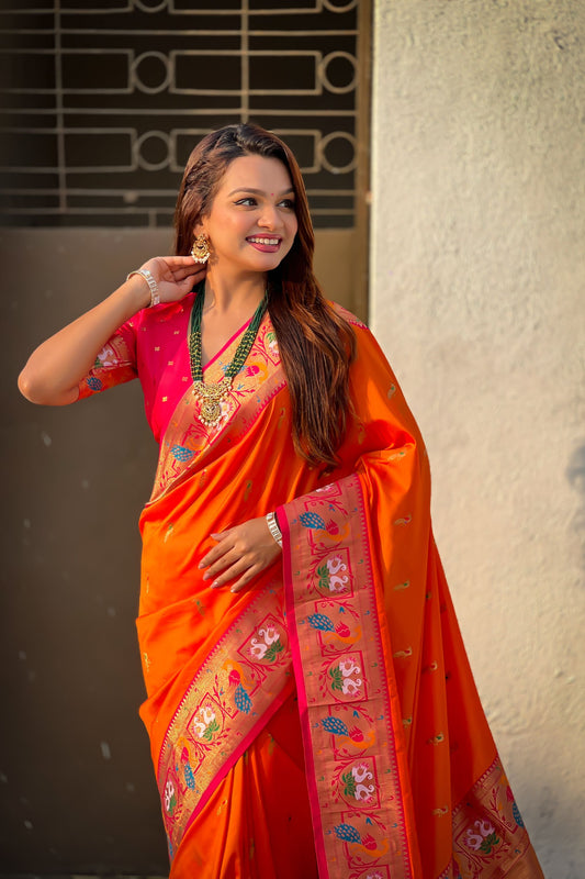 Orange Paithani Silk Saree with Contrast Pink Border Peacock Zari Pallu