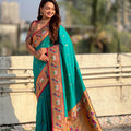Turquoise Green Paithani Silk Saree Golden Peacock Zari Pallu Pink Border