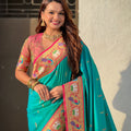 Turquoise Green Paithani Silk Saree Golden Peacock Zari Pallu Pink Border