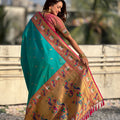 Turquoise Green Paithani Silk Saree Golden Peacock Zari Pallu Pink Border