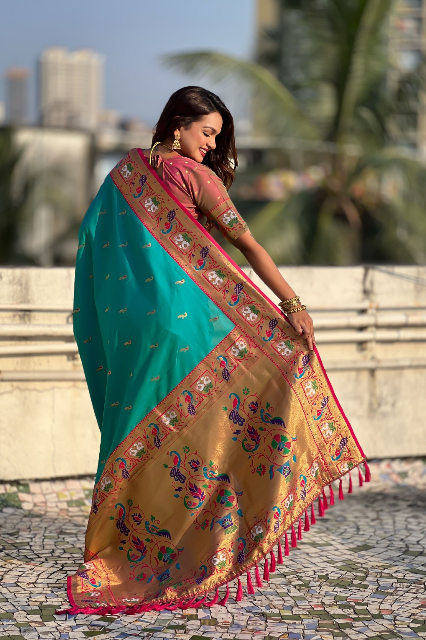 Turquoise Green Paithani Silk Saree Golden Peacock Zari Pallu Pink Border