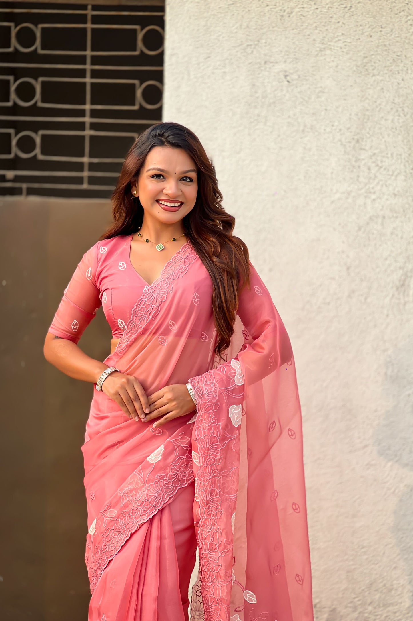 Peach Pink Organza Saree with Floral Embroidery Border