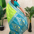 Green Banarasi Silk Saree with Blue Zari Border Floral Weaving Saree