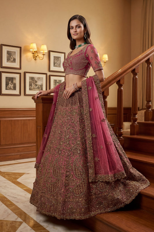 Wonderful Rani Pink Embroidered Wedding Wear Lehenga Choli with Net Dupatta