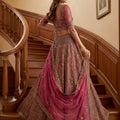 Wonderful Rani Pink Embroidered Wedding Wear Lehenga Choli with Net Dupatta