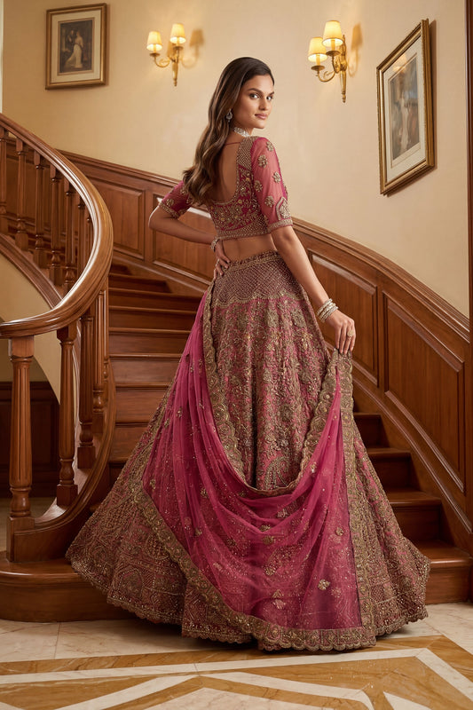 Wonderful Rani Pink Embroidered Wedding Wear Lehenga Choli with Net Dupatta