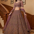 Glorious Purple Embroidered Wedding Wear Lehenga Choli with Net Dupatta