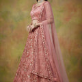 Amazing Peach Net Embroidered Bridal Lehenga Choli with Soft Net Dupatta