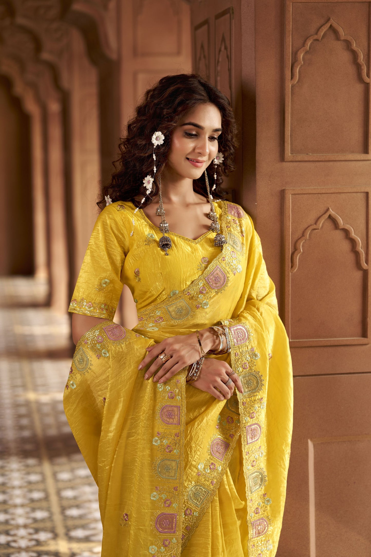 Bright Yellow Organza Saree Multicolor Embroidered Border