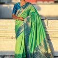 Green Banarasi Silk Saree Blue Contrast Border Floral Zari Weaving