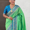 Green Banarasi Silk Saree Blue Contrast Border Floral Zari Weaving
