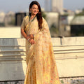 Cream Banarasi Silk Saree with Floral Zari Weaving Rich Golden Border