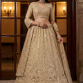 Elegant Beige Embroidered Wedding Wear Lehenga Choli with Net Dupatta