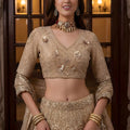 Elegant Beige Embroidered Wedding Wear Lehenga Choli with Net Dupatta