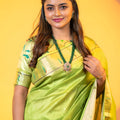 Parrot Green Paithani Silk Saree with Golden Zari Border Floral Pallu