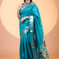 Teal Blue Paithani Silk Saree with Silver Zari Border Floral Pallu