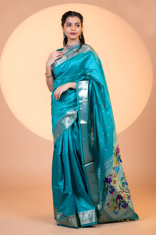 Teal Blue Paithani Silk Saree with Silver Zari Border Floral Pallu