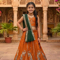 Festive Orange Peacock Embroidered Vichitra Silk Girls Lehenga Choli with Dupatta