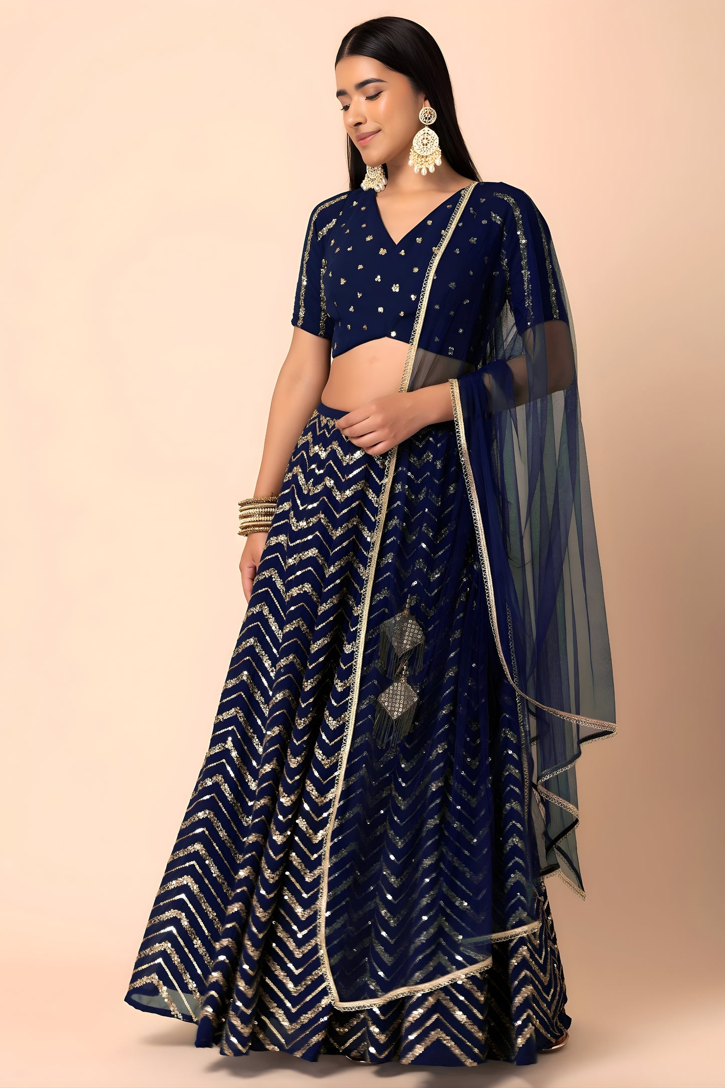 Luxury Royal Blue Faux Georgette Sequins Embroidered Lehenga Choli with Net Dupatta