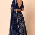 Luxury Royal Blue Faux Georgette Sequins Embroidered Lehenga Choli with Net Dupatta