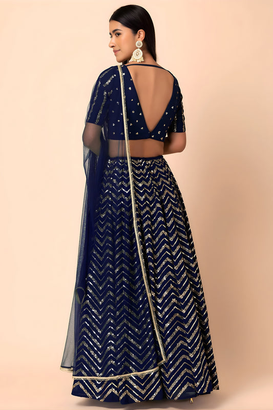 Luxury Royal Blue Faux Georgette Sequins Embroidered Lehenga Choli with Net Dupatta