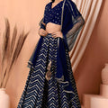 Luxury Royal Blue Faux Georgette Sequins Embroidered Lehenga Choli with Net Dupatta
