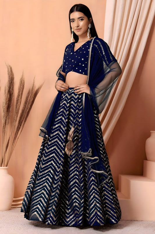Luxury Royal Blue Faux Georgette Sequins Embroidered Lehenga Choli with Net Dupatta