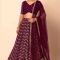 Stylish Wine Faux Georgette Sequins Embroidered Lehenga Choli with Net Dupatta