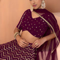 Stylish Wine Faux Georgette Sequins Embroidered Lehenga Choli with Net Dupatta