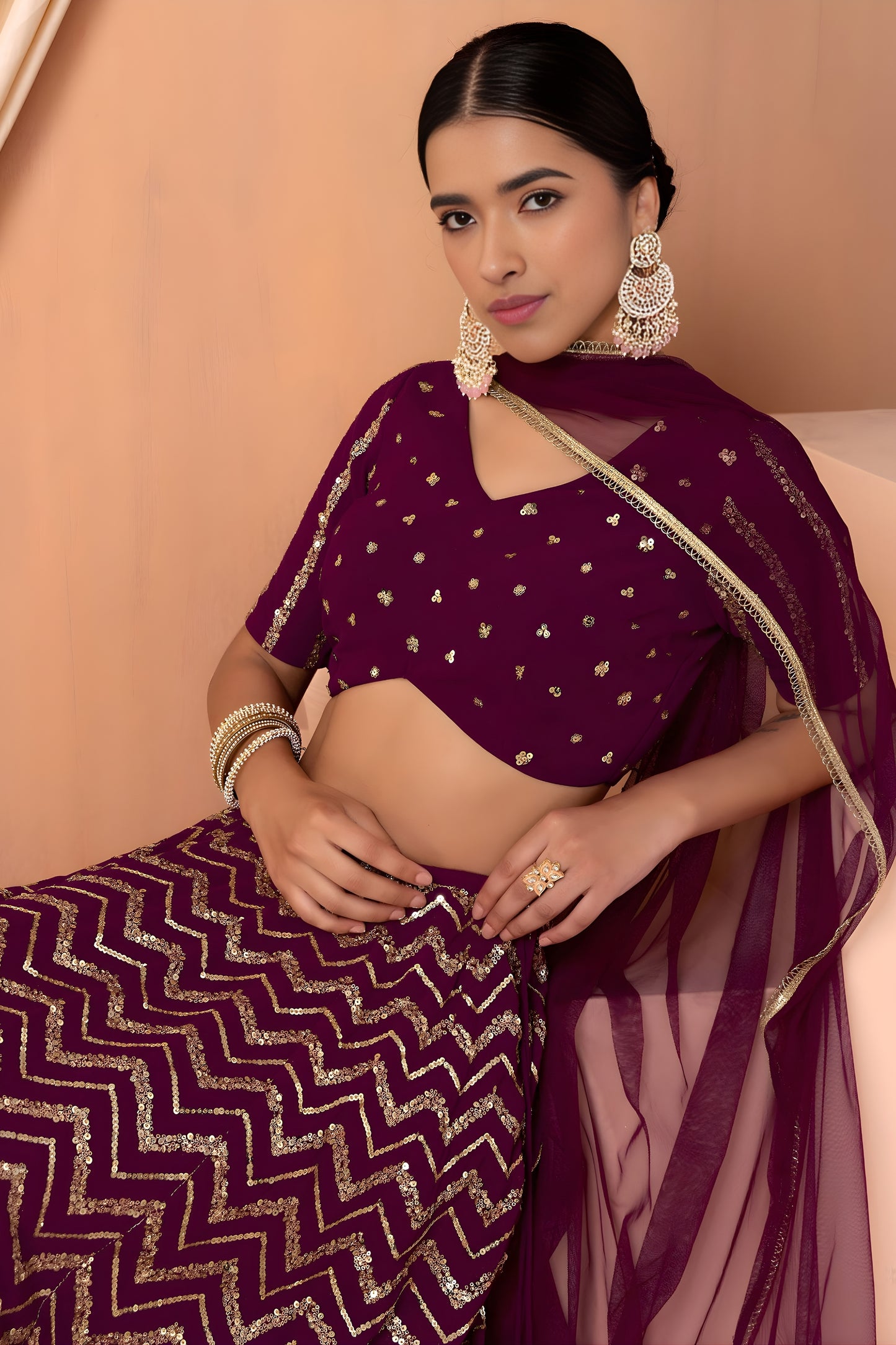 Stylish Wine Faux Georgette Sequins Embroidered Lehenga Choli with Net Dupatta