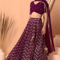 Stylish Wine Faux Georgette Sequins Embroidered Lehenga Choli with Net Dupatta