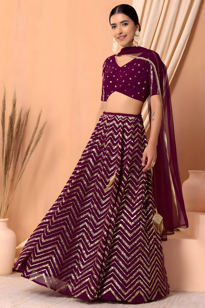 Stylish Wine Faux Georgette Sequins Embroidered Lehenga Choli with Net Dupatta