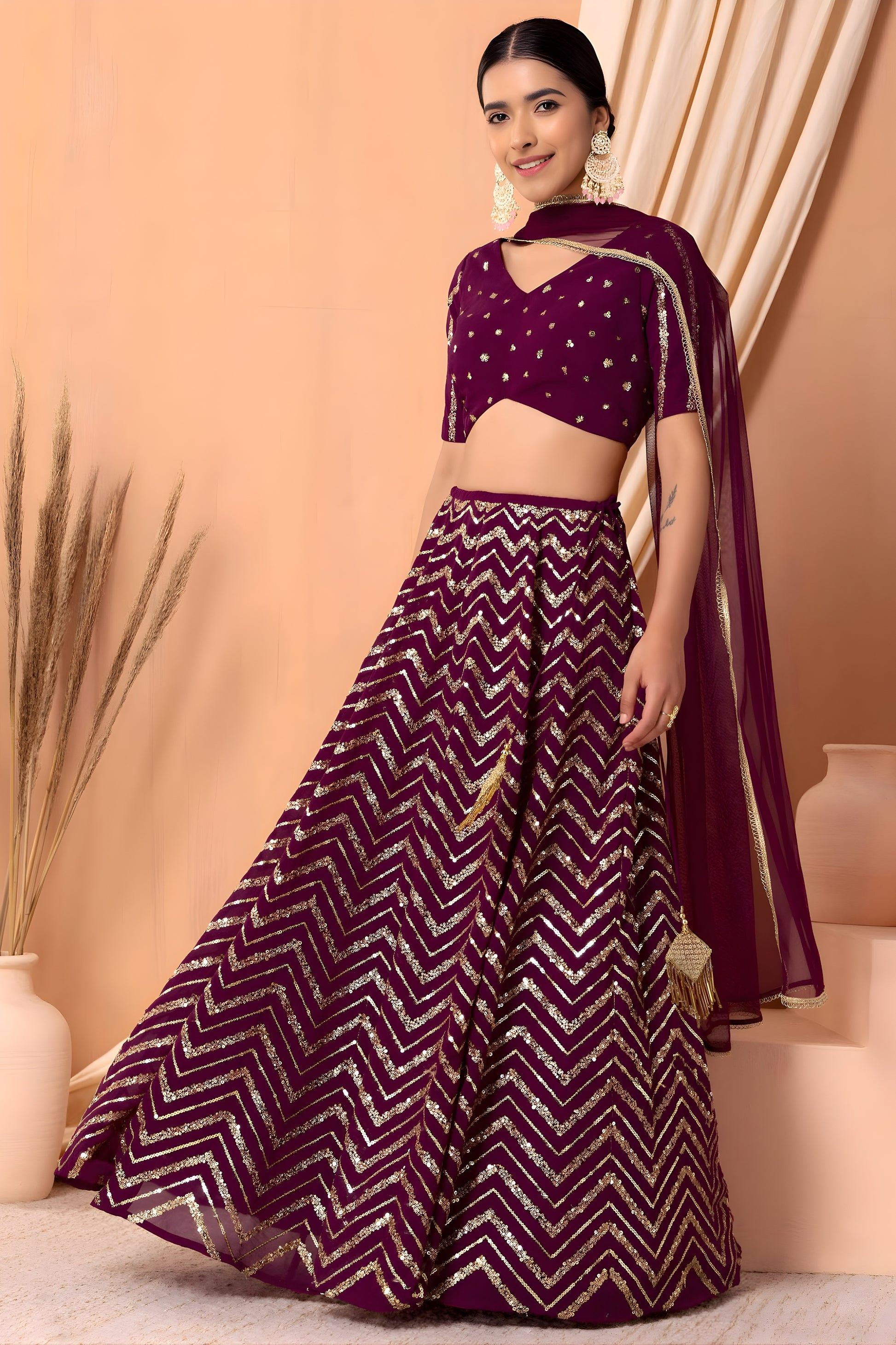 Stylish Wine Faux Georgette Sequins Embroidered Lehenga Choli with Net Dupatta