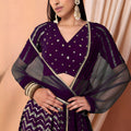 Stunning Purple Faux Georgette Sequins Embroidered Lehenga Choli with Net Dupatta