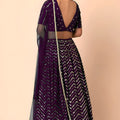 Stunning Purple Faux Georgette Sequins Embroidered Lehenga Choli with Net Dupatta