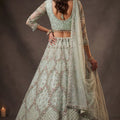 Elegant Sage Green Net Sequin Embroidery Work Bridal Lehenga Choli with Dupatta