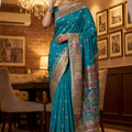 Graceful Teal Blue Traditional Woven Silk Saree with Rich Paithani Border