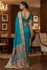 Graceful Teal Blue Traditional Woven Silk Saree with Rich Paithani Border